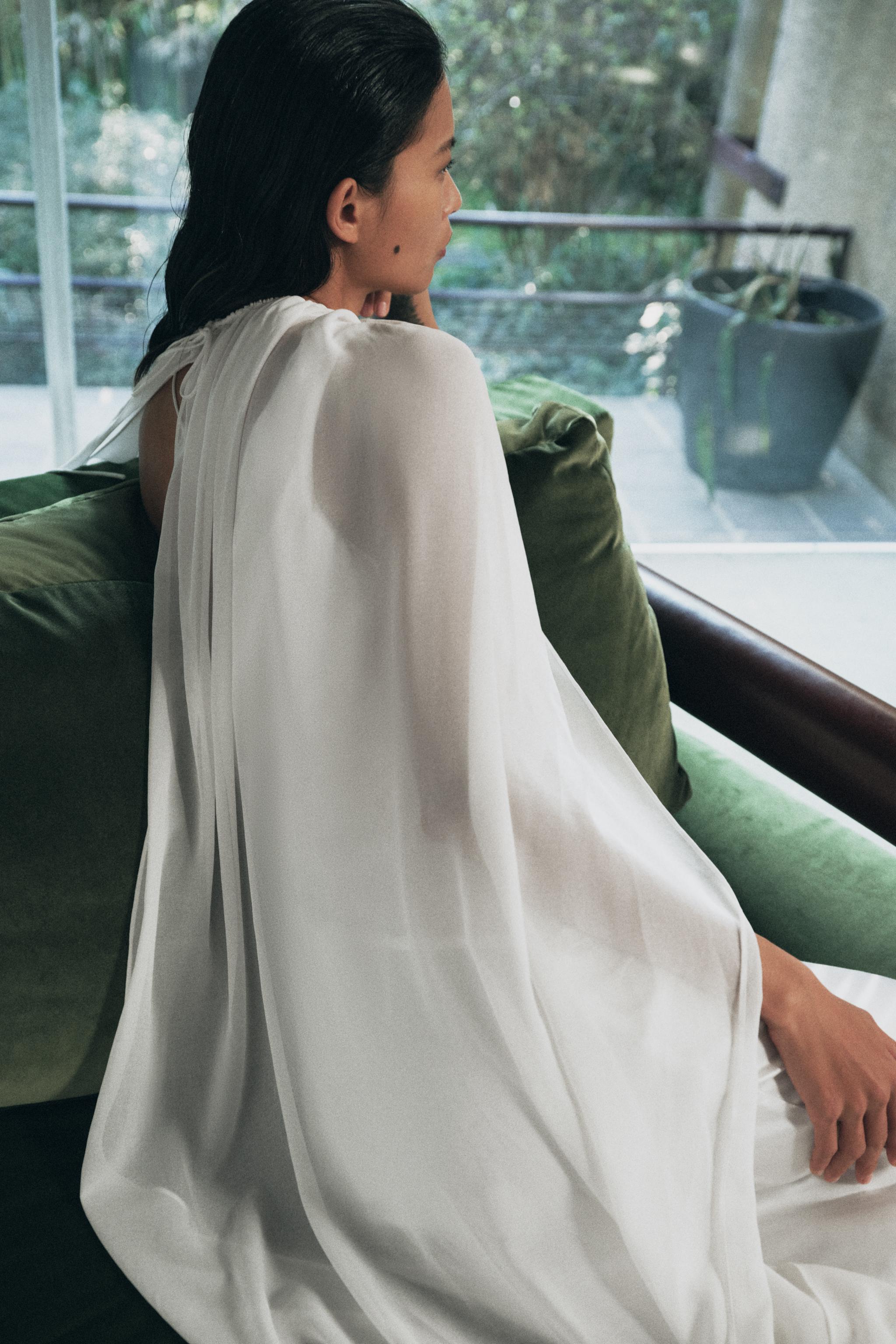 ASYMMETRIC LONG CAPE